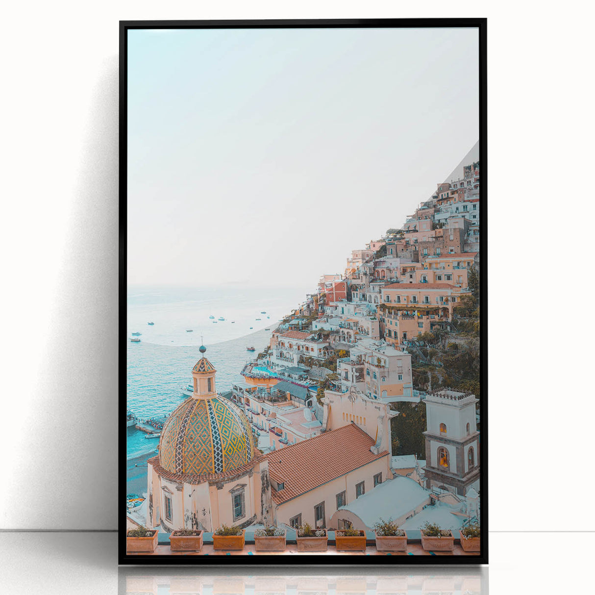 Large abstract wall art featuring swirling blue and white patterns on acrylic, framed in black.