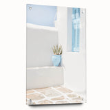 Large abstract wall art on acrylic glass featuring swirling blue and white patterns.