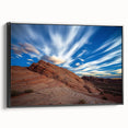 Framed canvas artwork showcasing a stunning cliff landscape in vibrant colors, presented in a sleek black frame, ideal for enhancing modern decor.