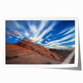 Vibrant rolled print showcasing a breathtaking landscape of cliffs against a serene sky, highlighting rich colors and intricate details, ideal for home decor.