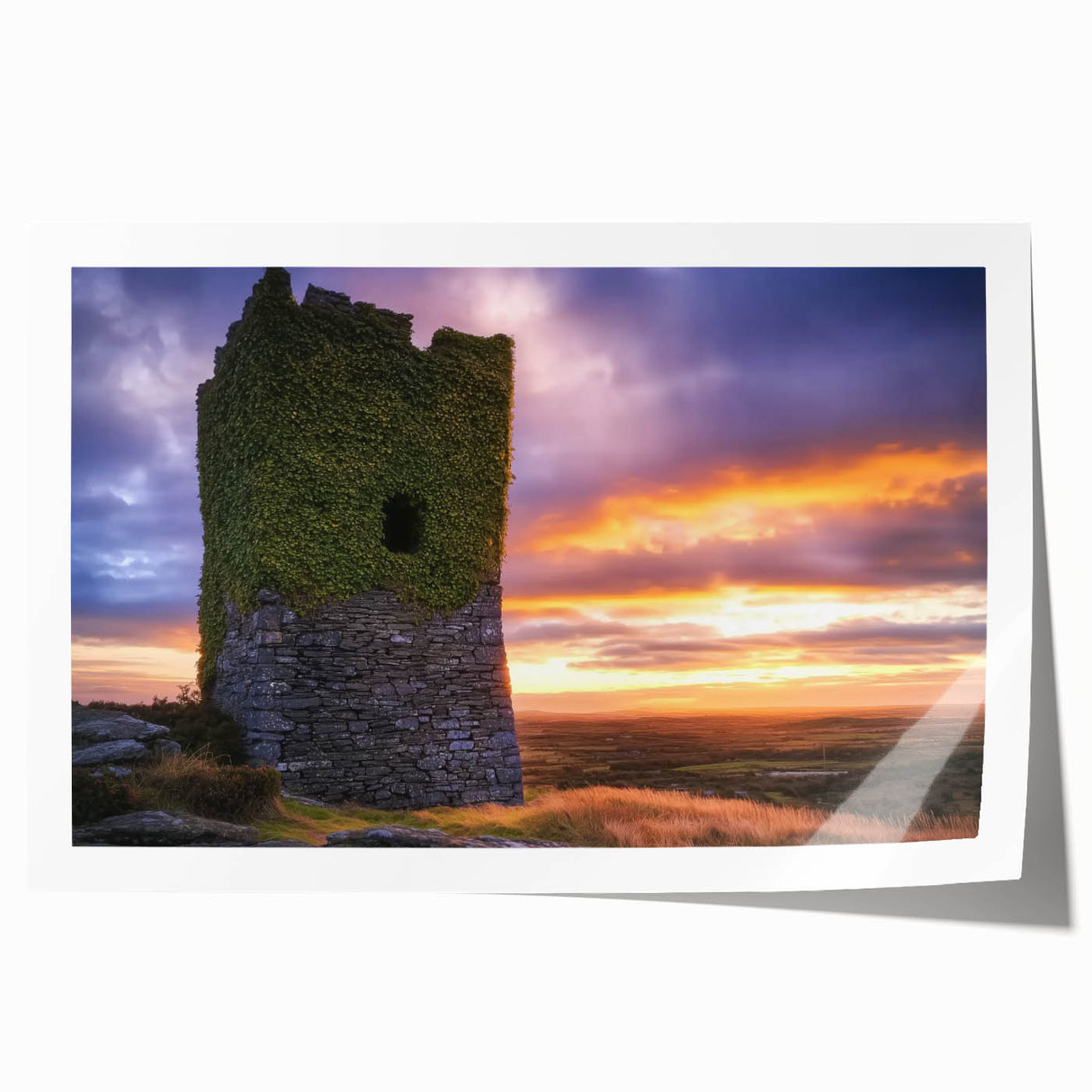 Stunning landscape print depicting a majestic castle surrounded by lush greenery, rolled for easy transport and display in a protective tube. Ideal for home decor.