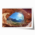 Desert landscape rolled canvas print showcasing vibrant warm hues of orange and yellow, featuring rolling dunes under a clear blue sky, ideal for home decor.