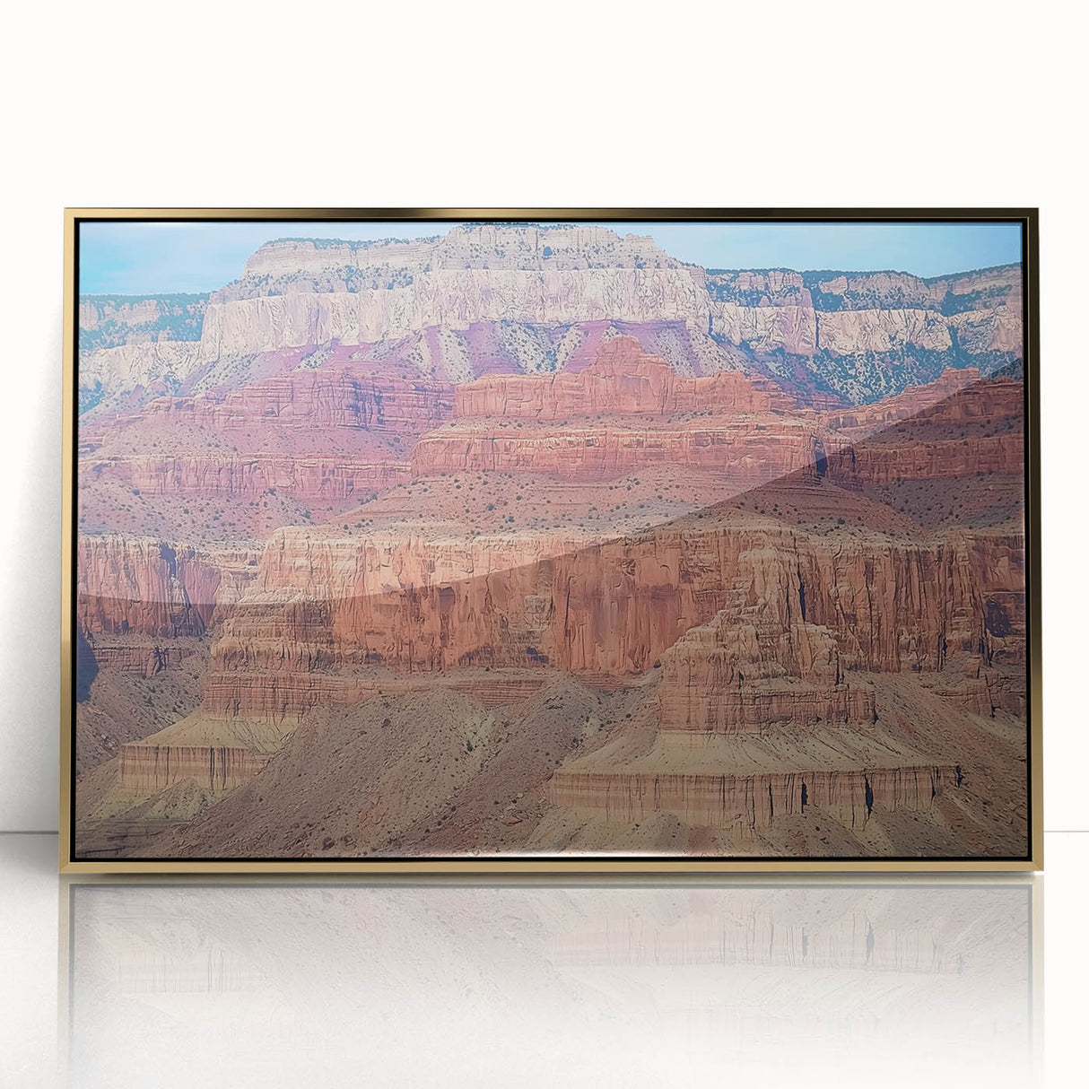 Framed acrylic artwork showcasing a stunning landscape of colorful canyons, featuring rich gold accents, designed to enhance modern decor with vibrant hues and depth.