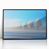 Framed acrylic landscape artwork showcasing a serene countryside scene with vibrant greenery and a clear sky, elegantly displayed in a sleek black frame.