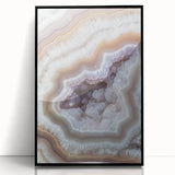 Large abstract wall art featuring swirling blue and green patterns on a black acrylic frame.