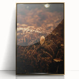 Large art print of a mid-century modernist autumn scene in muted gold and orange tones, framed acrylic.