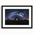 Framed landscape artwork showcasing a majestic castle surrounded by lush greenery, presented in a sleek black frame with a mat for an elegant finish. Ideal for enhancing home decor.
