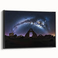 Framed canvas artwork showcasing a picturesque landscape featuring a majestic castle, presented in a sleek black frame, perfect for enhancing home decor.