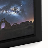 Close-up of a framed canvas artwork showcasing a vibrant landscape featuring a medieval castle surrounded by lush greenery, ideal for home decor.