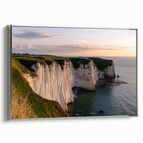 Framed canvas artwork showcasing a breathtaking landscape with dramatic cliffs, elegantly bordered in silver, ideal for modern home decor and nature enthusiasts.