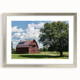 Silver-framed landscape barn print with a mat, showcasing rustic charm and detailed artwork, ideal for home decor or gallery displays.