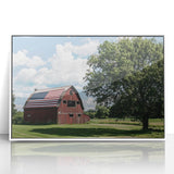 Framed acrylic wall art featuring a vibrant landscape design with a rustic barn, presented in a sleek white frame, ideal for home decor enhancement.