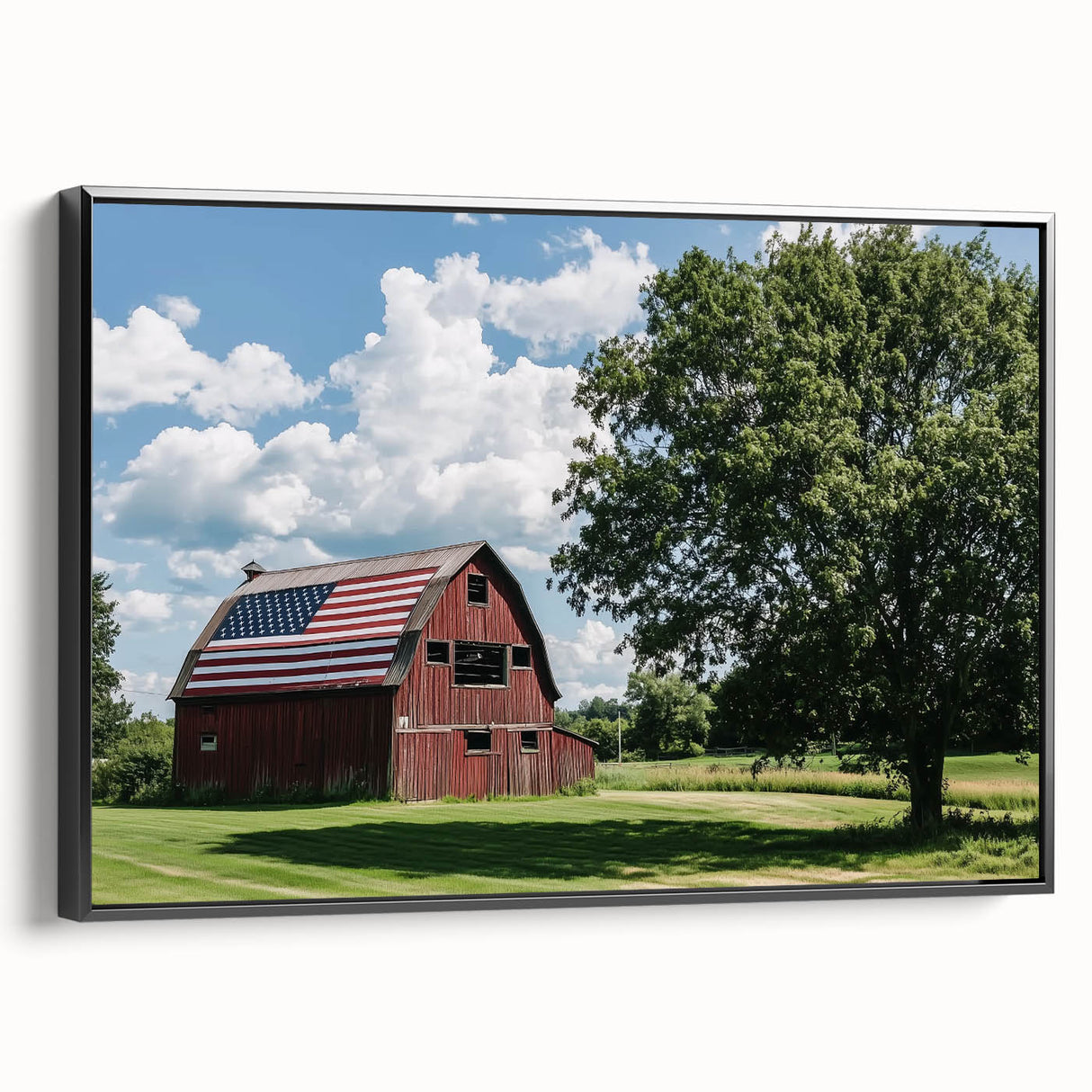 Landscape barn canvas print framed in black, showcasing a rustic scene with vibrant colors, ideal for home decor. Perfect for farmhouse-style interiors.
