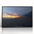 Framed acrylic artwork showcasing a vibrant desert landscape with striking colors and details, elegantly presented in a sleek black frame, ideal for home decor.