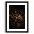 Abstract art print featuring vibrant autumn colors on a textured canvas, framed in black, ideal for living room decor.