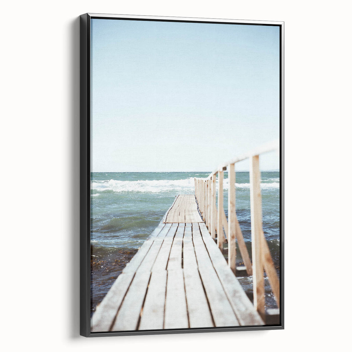 Black and white wall art featuring a vintage poster-style landscape painting on a framed canvas, ideal for bedroom decor.