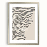 Textured abstract art print in cool blue and white tones, framed in silver, ideal for bedroom wall decor.