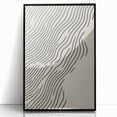 Large abstract wall art depicting a winter scene in muted blue and white tones, framed in black acrylic.