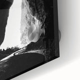 Close-up view of an intricate acrylic glass artwork depicting a vibrant landscape with caves, showcasing rich textures and colors, ideal for modern decor.