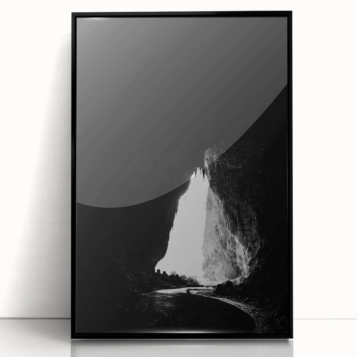 Framed acrylic artwork showcasing a stunning landscape with intricate cave formations, featuring a sleek black frame that enhances the visual appeal. Perfect for modern home decor.