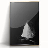 Framed acrylic artwork showcasing a stunning landscape with caves, featuring a gold border and a sleek front view, perfect for modern home decor.