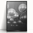 Large abstract wall art featuring swirling blue and white patterns on a black acrylic framed print.