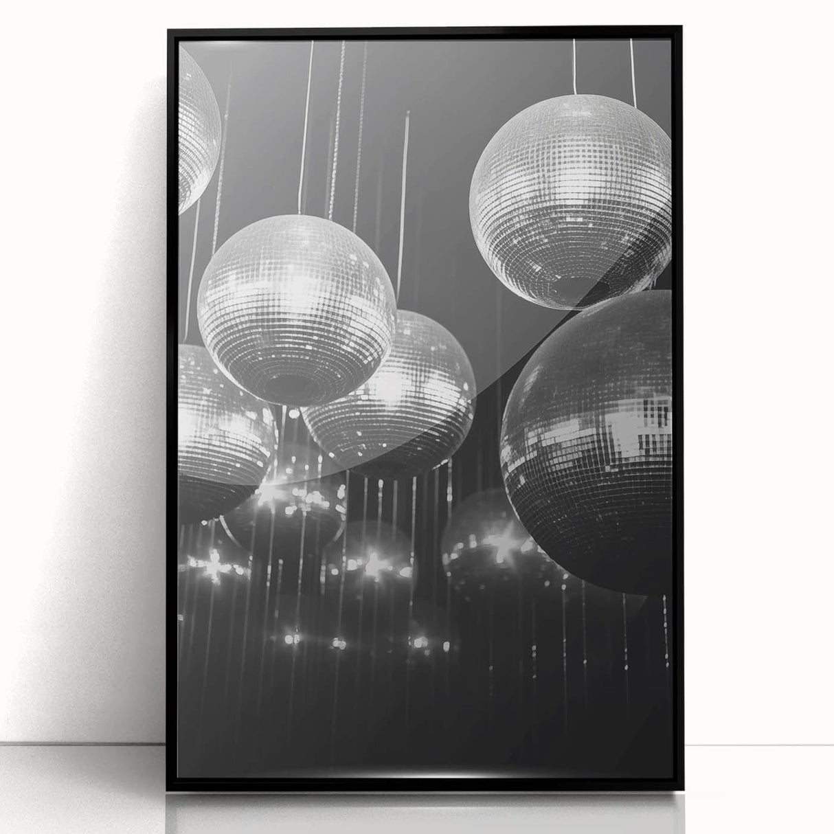 Large abstract wall art featuring swirling blue and white patterns on a black acrylic framed print.