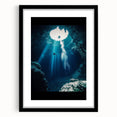 Framed landscape artwork depicting an intricate cave scene, featuring a sleek black mat and frame, ideal for contemporary home decor and art enthusiasts.