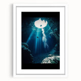 Framed landscape artwork showcasing a serene cave scene, featuring earthy tones and intricate details, presented in a white mat for a polished look. Ideal for home decor enthusiasts seeking nature-inspired aesthetics.