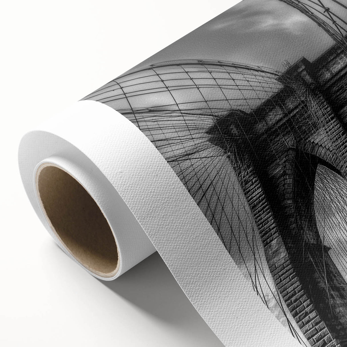 Rolled canvas print showcasing a vibrant landscape bridge design with rich colors, carefully packaged in a protective cardboard tube for safe shipping.