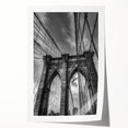 Rolled print showcasing a vibrant landscape bridge scene, featuring lush greenery and a serene river, packaged securely in a protective cardboard tube for safe delivery.