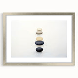 Textured art print featuring abstract shapes in muted earth tones, framed with a silver mat, suitable for bedroom decor.