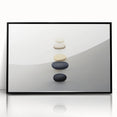 Large abstract wall art featuring natural elements in muted earth tones, framed in black acrylic.