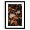 Extra large abstract art print featuring textured, colorful autumn leaves, in a black frame with mat.