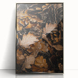 Mid-century modernist art depicting an autumnal scene in muted orange and brown tones, framed in silver acrylic.