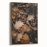 Framed canvas featuring a vintage-style landscape painting with autumnal trees in gold and black tones.