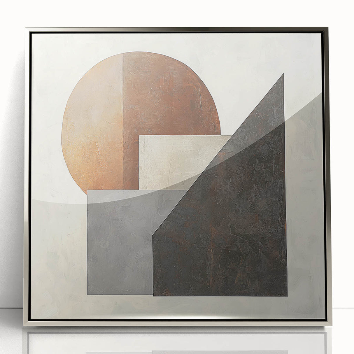 Framed acrylic artwork showcasing an abstract geometric design in silver tones, ideal for modern decor. The piece features sharp lines and a sleek finish, enhancing contemporary interiors.