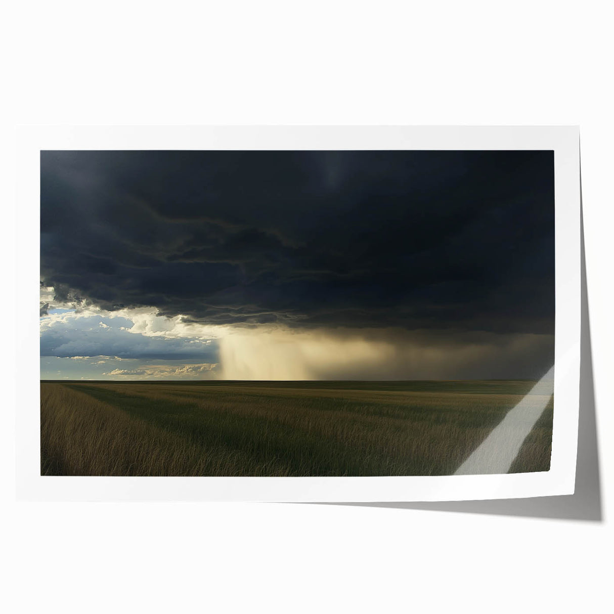 Rolling countryside landscape print showcasing vibrant green fields and a serene blue sky, elegantly packaged in a protective cardboard tube for art enthusiasts.