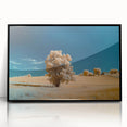 Framed acrylic artwork depicting a serene landscape with lush green fields and a clear blue sky, presented in a sleek black frame, ideal for home decor.
