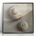 Large abstract wall art featuring swirling patterns in muted earth tones, framed in black acrylic.