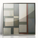 Framed acrylic artwork showcasing an abstract geometric design in silver hues, perfect for modern decor. The piece features clean lines and a sleek finish, adding a contemporary touch to any space.
