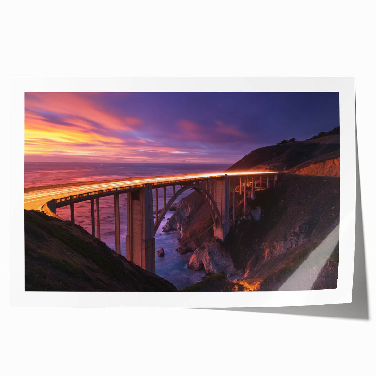 Landscape bridge artwork rolled print showcasing a serene river scene with lush greenery and a blue sky, packaged in a durable cardboard tube for safe transport. Perfect for home decor or art enthusiasts seeking nature-inspired designs.