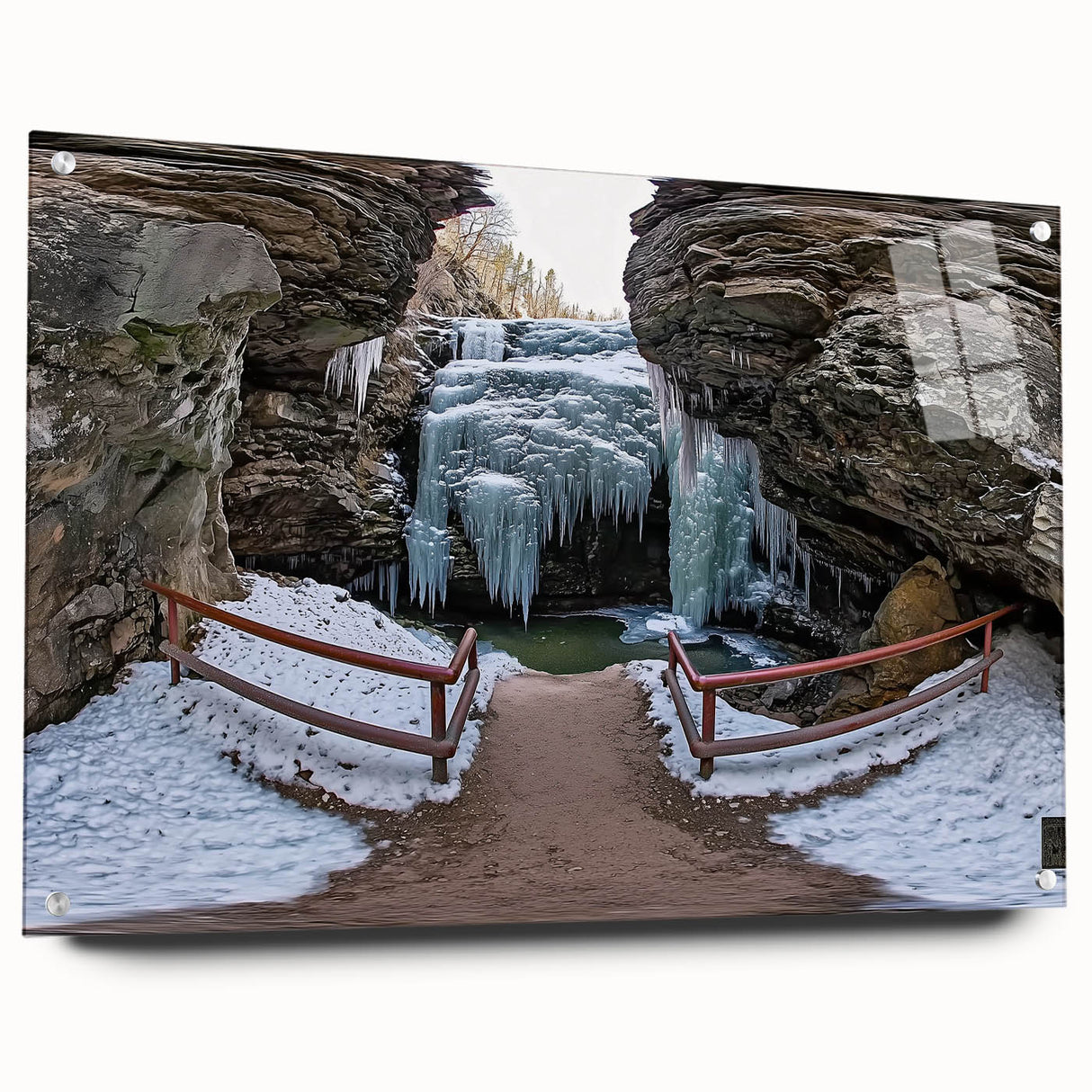 Landscape acrylic art piece showcasing vibrant canyons in rich earth tones, displayed in a sleek glass frame with pins for secure mounting, ideal for home decor.