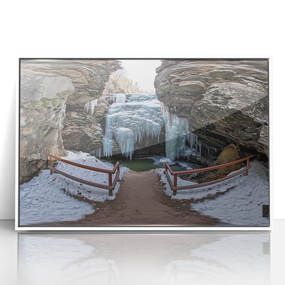 Framed acrylic artwork showcasing a stunning landscape of colorful canyons, set against a white background, ideal for modern home decor and artistic expression.