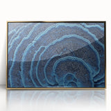 Large art print of close-up floral imagery in soft pastels on acrylic, framed in gold, suitable for nursery wall art.