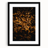 Extra large abstract art print featuring vibrant fall colors on a textured canvas, framed in black.