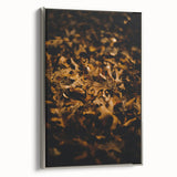 Side view of a framed canvas depicting a fall landscape with colorful leaves, ideal for living room decor.