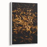 Vintage poster art featuring a fall scene with colorful leaves on a black background, framed canvas.
