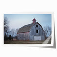 Rolled landscape barn art print showcasing a rustic farmhouse scene with vibrant colors, expertly wrapped in a protective tube for safe delivery.