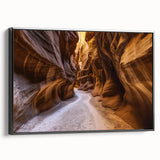 Framed canvas artwork depicting a stunning landscape of canyons in rich earthy tones, showcasing dramatic rock formations and a serene atmosphere, ideal for home decor.